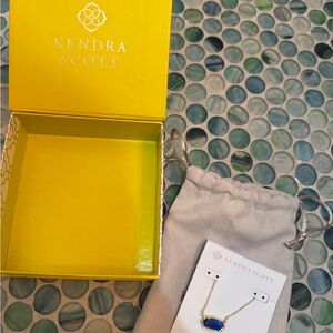 Kendra Scott Gold Chain Necklace with Deep Blue Stone